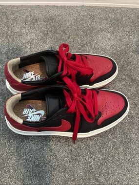 Nike Women's Air Jordan 1 Low-Top Sneaker in Red, Black and White